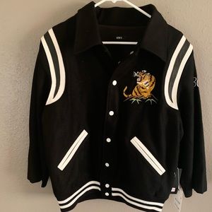 Black and white lettermen type jacket. New, size med